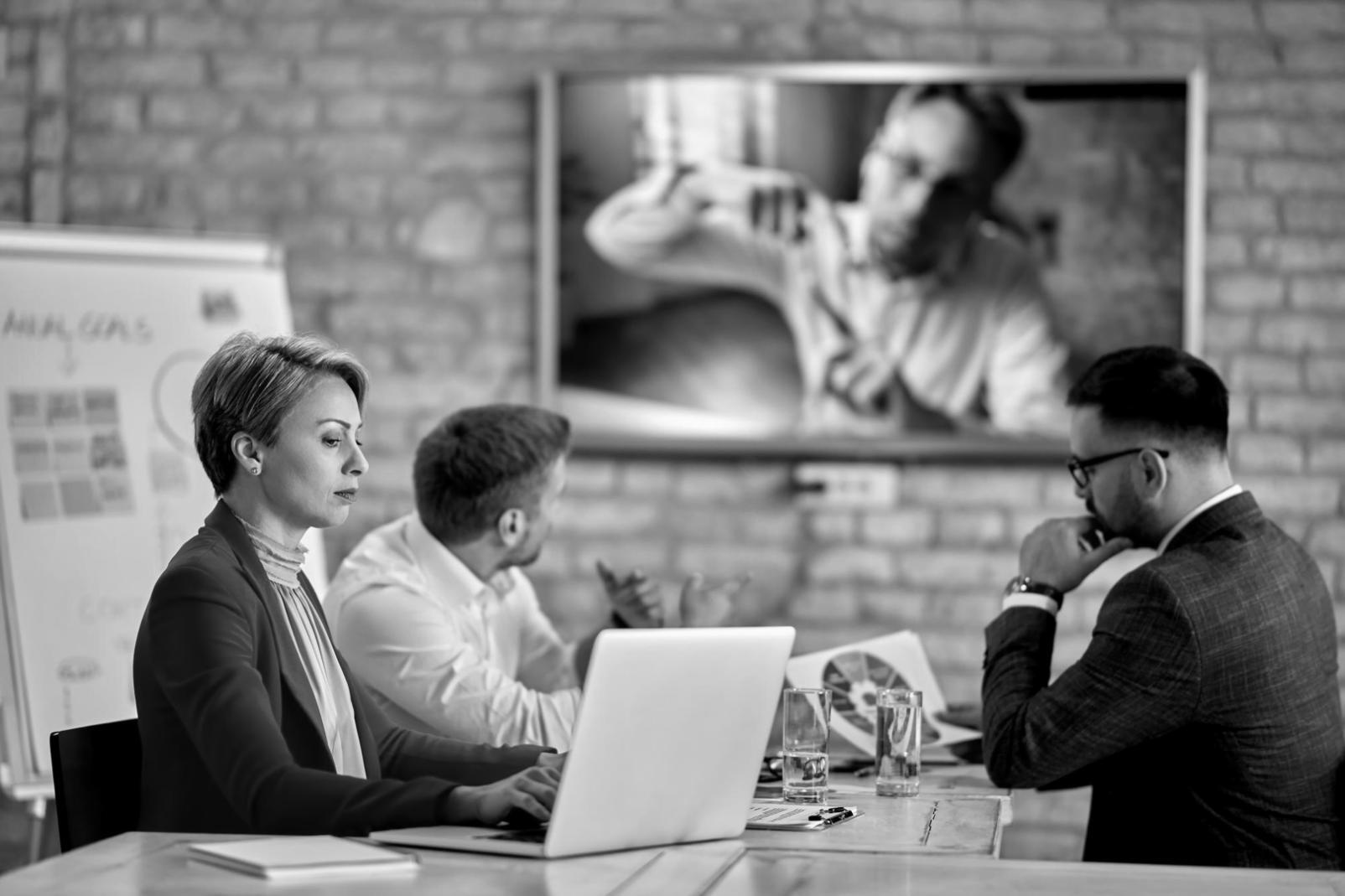 Participants working through complex financial scenarios